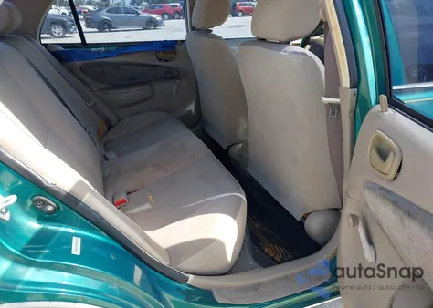 1998 Toyota Corolla Ve z USA, uszkodzony, nr VIN 1NXBR12E9WZ080912